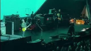 Pearl Jam's Mike McCready falls of stage during 'Porch' solo.