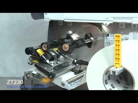 Как установить носитель и риббон в принтер этикеток Zebra ZT230 Как установить носитель и риббон в принтер этикеток Zebra ZT230