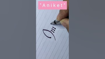 How to write "Aniket" name in calligraphy #calligraphy #cursive #handwriting #youtubeshorts #shorts