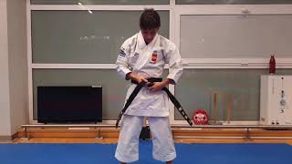 SANDRA JAIME SANCHEZ KARATE KATA BELT TYING