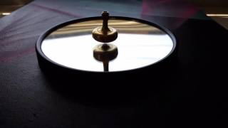 Lambda SOLID Brass Top with instrument-grade ruby sphere, made by Prometheus Lights.