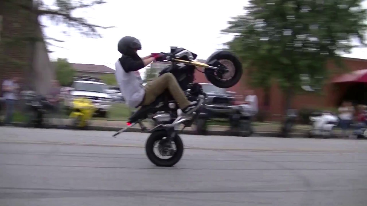Kid Stunts A Black 2015 Honda Grom Stand Up And Sit Down Wheelies