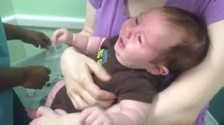 2-month-old Xavier getting his first shots on 5-17...