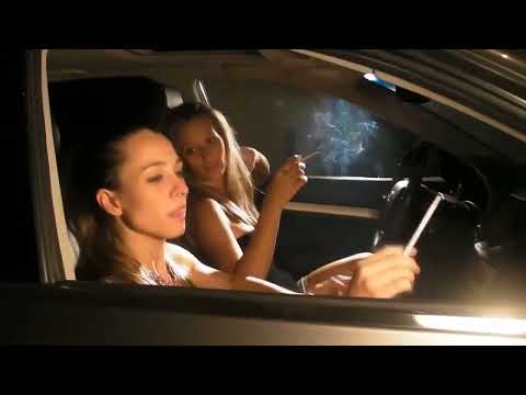 2 cute sisters smoke a all-white 120 in a car