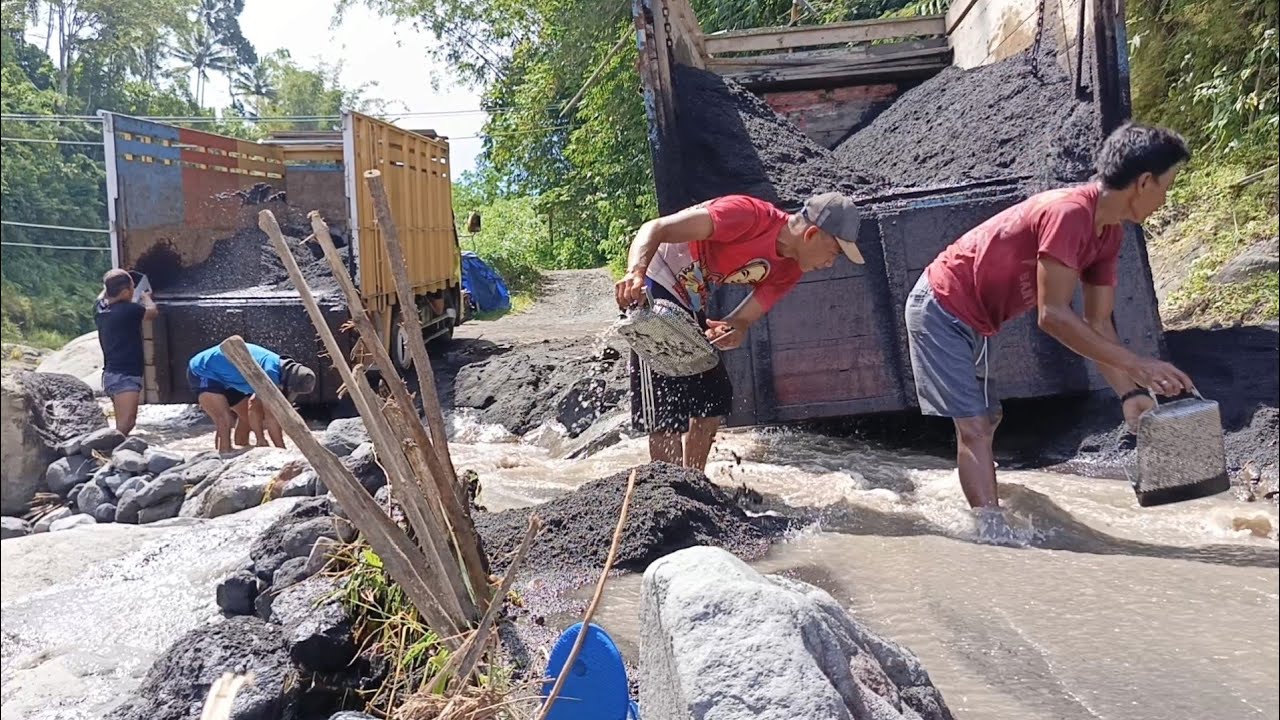 Loading Sand With Two Truck Loading Lanes