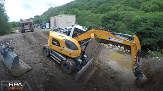 Liebherr A914 Compact - YouTube