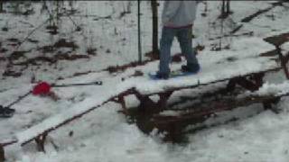 snowskating on benches and tables