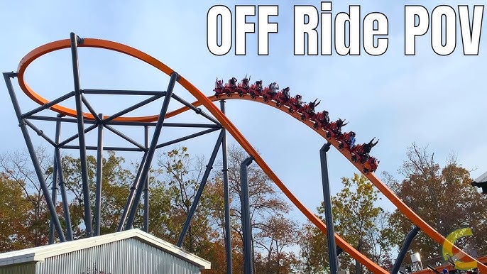 Jersey Devil Coaster, Six Flags Great Adventure], valleyed during a test  run. Visible from Nitro's lift hill is one of the Jersey Devil Coaster  trains valleyed in the dip before the mid-course