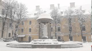 a Monument in the Old Town Covered With Snow