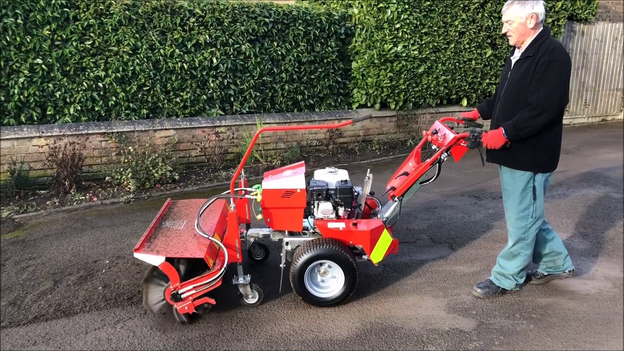 Nimos Mosquito HA c/w Sweeper Brush Clearing a Driveway