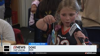 Brown Elementary School students paint ornaments for Capital tree