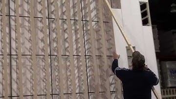 Insulated Concrete Form (ICF) - TF Forming Systems - Installing interior panels on a tall wall