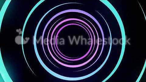 Abstract light tunnel formed by colorful moving rings on black background, seamless loop. Animation