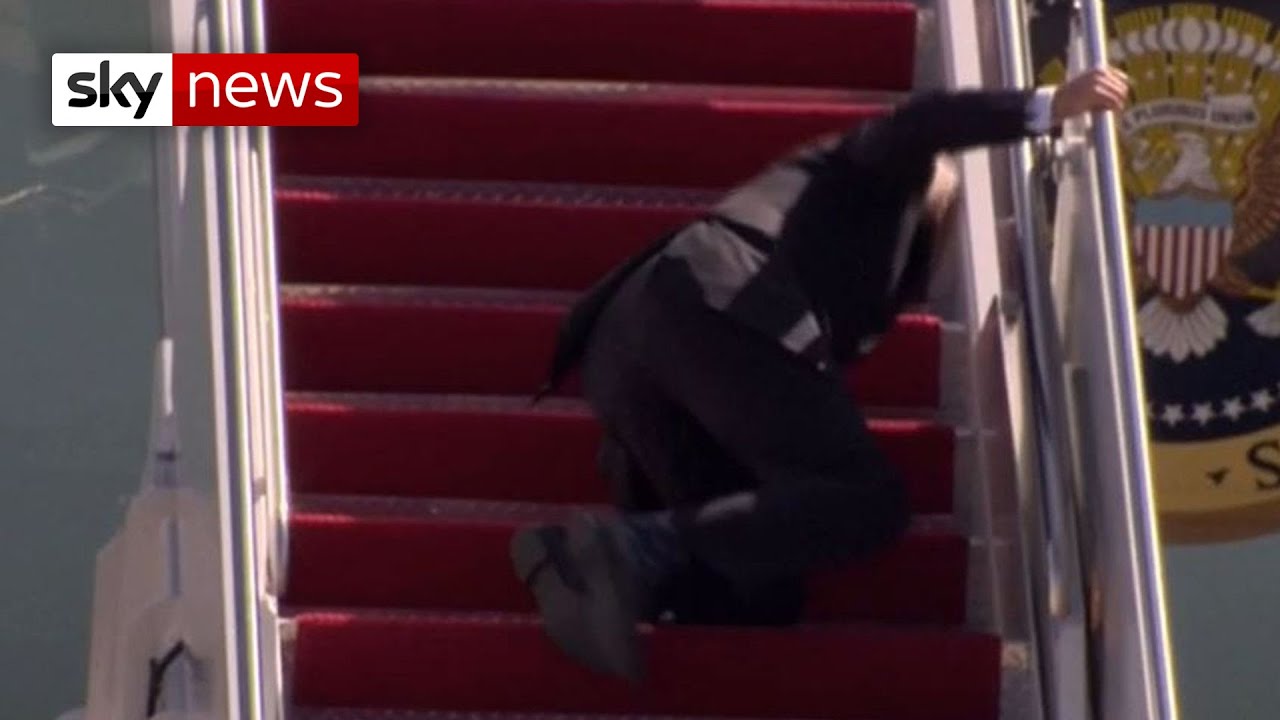 Biden Falls Three Times Walking Up Steps to Air Force One
