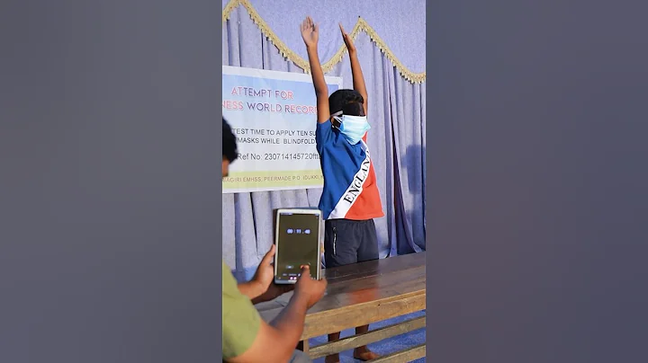 Fastest time to apply 10 surgical masks blindfolded - 11.56 seconds by Josukutty Ebin 🇮🇳