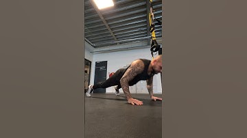 Push-up to Alternating Pike Toe Touch