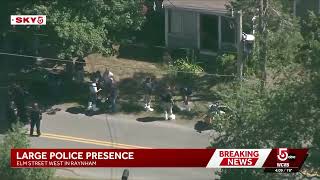 Road closed, investigators seen working at Raynham home