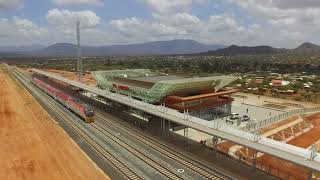 4K Aerial Shot of SGR passing through Voi Station!