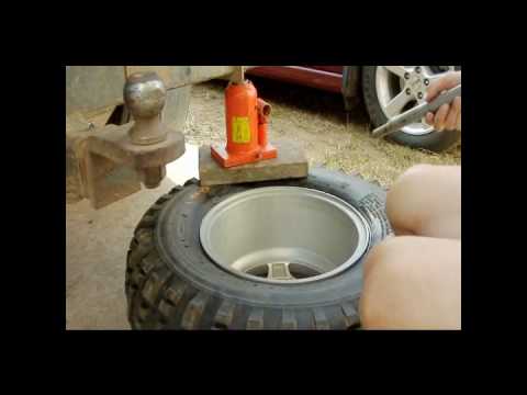 Debeading a tyre from an ATV rim / wheel Everyone Happy ...