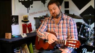 Jason Wilcox - Tuning a guitar