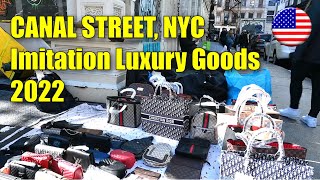 Selling imitation luxury goods on Canal Street, New York City, 2022