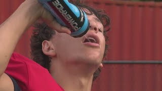 Sports with Sam: Georgia football teams train in extreme heat for Coca-Cola Classic