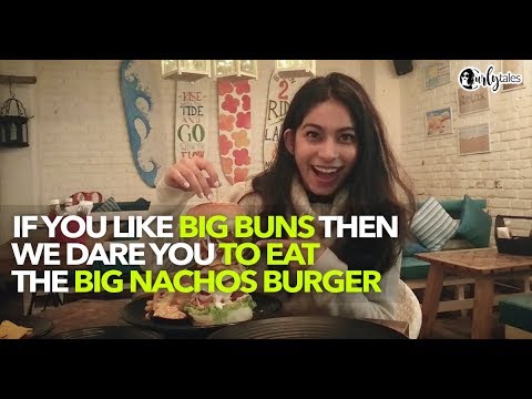 Dig Into This Big Nachos Burger Stacked With Nachos & Cheese In Delhi | Curly Tales