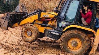 Jcb 3Dx 4X4 Excavator Escaping Through Slippery Mud Road Offroad