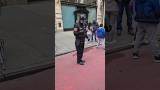 Batman dancing his way through the Easter Parade in New York City