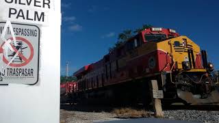 FEC Train 127 slowly moves through Melbourne