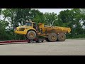 Unloading a Volvo A40G 6 Wheel Articulating Dump Truck