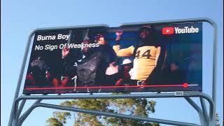 Burna Boy No Sign of Weakness New Album YouTube Billboard Sunset Blvd Los Angeles CA July 11, 2025