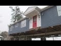 Rising Above The Flood: Raising homes above the 100-year flood level