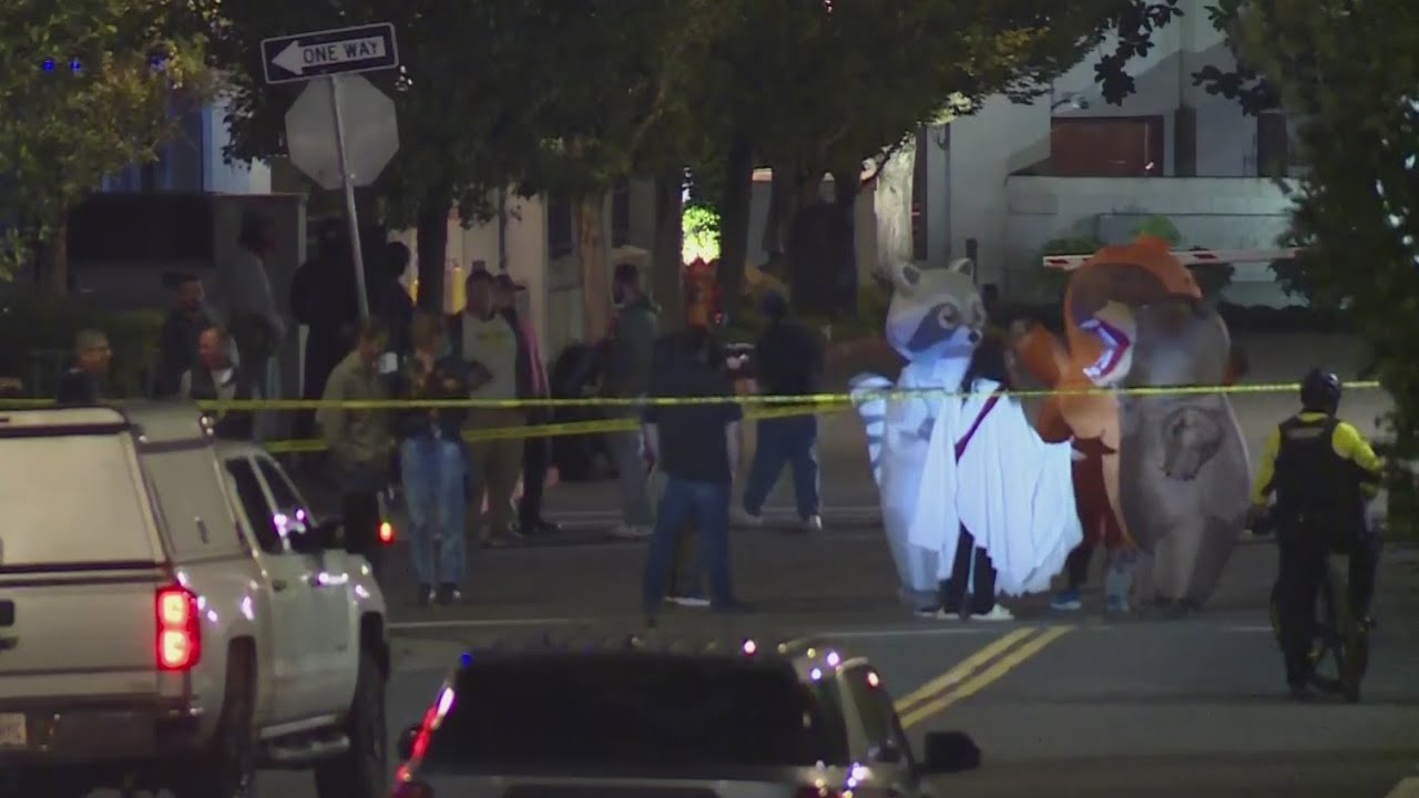 Costumed protesters outside Portland ICE facility as Kristi Noem visits