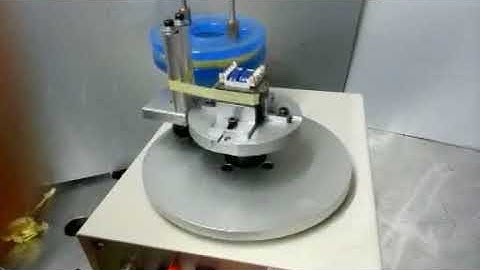 Automatic taping machine WM-1000R. newwinhk@hotmail.com