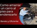 Como amarrar un carro al piso para enderezarlo