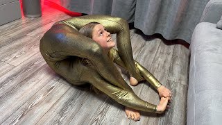 Contortion at Home in Gold Catsuit. Morning Stretching Circus Artist. Flexshow