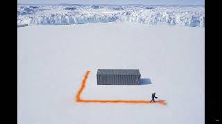 Worker sprays a perfect rectangular construction outline onto the snow-covered ice.