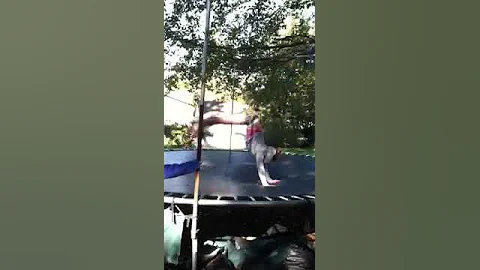 Backhand spring on trampoline