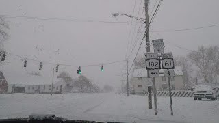 Snow Storm Makes Traveling On Roadways And Bus Routes Difficult