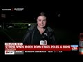 Strong winds knock down trees, poles, signs