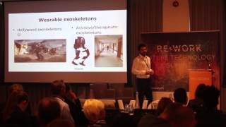 Bioinspired Management of Interactions During Walking Assisted by Compliant Wearable Exoskeletons