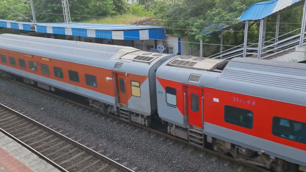 Train passing through Umroli Railway Station- Indian Railways