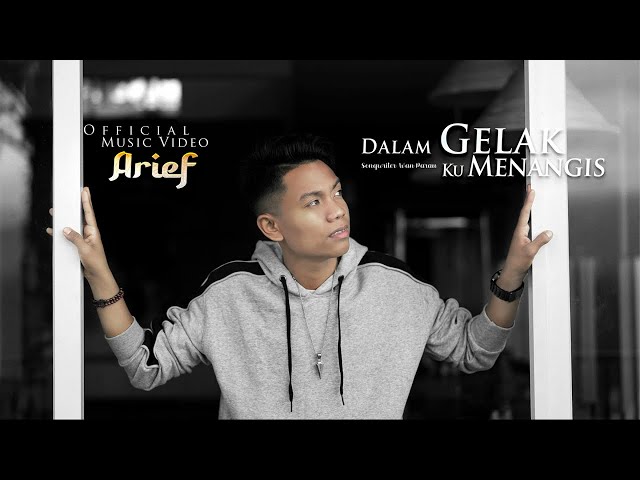 Arief - Dalam Gelak Ku Menangis (Official Music Video) class=