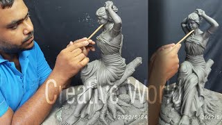 A Female Sculpture Setting On a Tree Made Of Clay..https://youtu.be/xKSDHGCcTAc#art #artist #clay