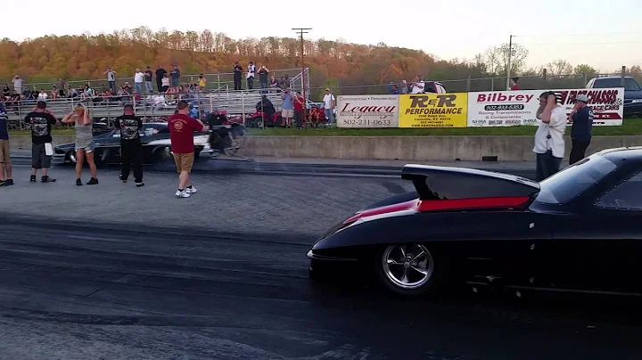 Art McMahan in his 1957 chevy street car Pro Mod