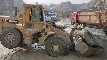Ultimate Power Show of Caterpillar 966D: A Massive Rock Loading Video
