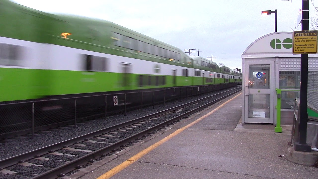 GO Transit trains meet at Rouge Hill station. - YouTube