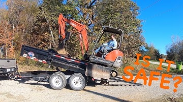 Loading a Mini Excavator in a Dump Trailer