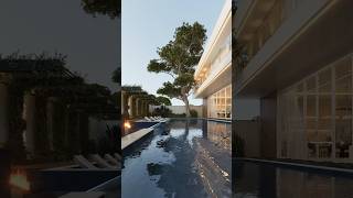A modern house by a serene pond, birds in flight, and vines covering the walls.🍃